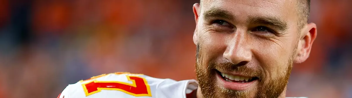 Travis Kelce smiles with a lot of joy.